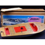 A VINTAGE SUTCLIFFE 20 DIAL SPEEDBOAT IN ORIGINAL BOX WITH INSTRUCTIONS.