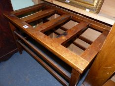 A PAIR OF EARLY 20th.C.MAHOGANY LUGGAGE STANDS WITH SLATTED TOPS. 68 x 41 x H.45cms.