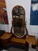AN ANTIQUE BIEDERMEIER STYLE SATINWOOD DRESSING TABLE WITH LARGE CHEVAL TYPE MIRROR. W.144cms.