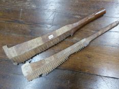 AN ANTIQUE OCEANIC SAMOAN CARVED HARDWOOD WAR CLUB NIFO'OTI WITH SERRATED EDGE, INCISED DECORATION