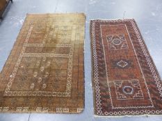 AN ANTIQUE AFGHAN ENGSI RUG. 214 x 136cms. TOGETHER WITH A SMALLER ANTIQUE BELOUCH RUG.