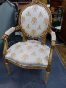 A FRENCH CARVED GILTWOOD ARMCHAIR IN THE LOUIS XVI TASTE, LABELLED BALZAROTTI, PARIS.