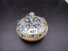 A POTTERY MOON FLASK, POSSIBLY TURKISH, PAINTED ON ONE SIDE WITH FOUR AUBERGINE OUTLINED BLUE LEAVES