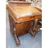 A VICTORIAN WALNUT DAVENPORT DESK WITH RISING SLOPE AND FITTED FOUR DRAWERS TO SIDE. W.53 x H.