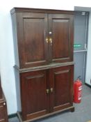 A 19th.C.OAK CABINET WITH FITTED DRAWERS AND PANEL DOORS WITH A SHELVED UPPER SECTION. W.106 x H.