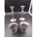 A PAIR OF VICTORIAN SILVER FLUTED VASES DATED 1892, FOR CHARLES HENRY DUMENIL. GROSS WEIGHT