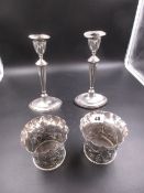 A PAIR OF VICTORIAN SILVER FLUTED VASES DATED 1892, FOR CHARLES HENRY DUMENIL. GROSS WEIGHT