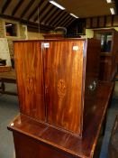 AN INLAID MAHOGANY GEO.III TABLE CABINET WITH ADJUSTABLE SHELVES, PRINCE OF WALES FEATHER OVAL