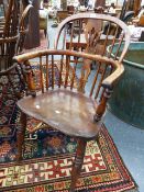 A SET OF THREE 19th.C.BEECH AND ELM LOW BACK WINDSOR ARMCHAIRS WITH CRINOLINE STRETCHER AND A