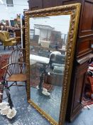 A LARGE MODERN VICTORIAN STYLE RECTANGULAR GILT FRAME WALL MIRROR WITH MOULDED FRAME. 170 x 92cms.