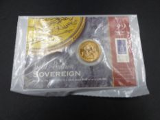 A SEALED 22ct GOLD PROOF FULL SOVEREIGN, DATED 2000.