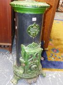 A VINTAGE FRENCH GREEN ENAMELLED STOVE / ROOM HEATER FITTED WITH GAS BURNER AND NAMED GODIN. NOTE: