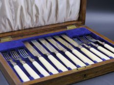 A SILVER AND BONE CASED TWELVE PIECE CUTLERY SET DATED 1920 FOR JAMES DIXON & SONS, LTD.