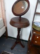 A VICTORIAN HEIGHT ADJUSTABLE SHAVING MIRROR WITH PLATFORM COMPARTMENTS ON SHAPED TRIPOD LEGS