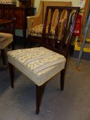 A SET OF SIX GEO.III. CARVED MAHOGANY DINING CHAIRS, NEEDLEWORK SEATS. (6)