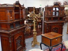 AN IMPRESSIVE PAIR OF VICTORIAN CONTINENTAL CARVED ROSEWOOD PIER / DISPLAY CABINETS WITH MIRROR BACK