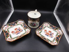 A PAIR OF COPELAND SPODE SQUARE DISHES DECORATED IN RED, GREEN AND BLUE WITH FLOWERS, IMPRESSED DATE