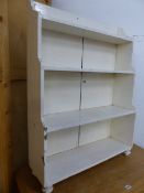 A 19th.C. SMALL WATERFALL BOOKCASE ON SHORT TURNED LEGS. 76 x 24 x H.100cms.