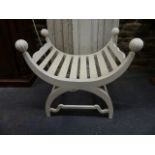 A PAIR OF UNUSUAL CARVED AND PAINTED CONSERVATORY / WINDOW SEATS OF U-SHAPE WITH RIBBED BALL