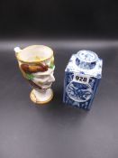 A DELFT BLUE AND WHITE SCREW LIDDED TEA CADDY, THE SQUARE SECTIONED SIDES WITH ALTERNATING OVALS