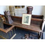 A PAIR OF CARVED OAK VICTORIAN PUGINESQUE DESIGN PEWS WITH PANELLED BACK AND PIERCED TRESTLE FORM