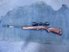 AIR RIFLE. WEIHRAUCH HW57 .22 UNDER LEVER COMPLATE WITH EXCEVAN 3-9 x 56 SCOPE.