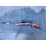 AIR RIFLE. WEIHRAUCH HW57 .22 UNDER LEVER COMPLATE WITH EXCEVAN 3-9 x 56 SCOPE.