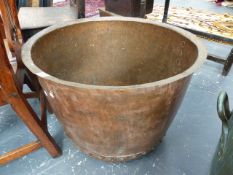 A LARGE ANTIQUE RIVETED COPPER COPPER. Dia.66 x H.48cms.