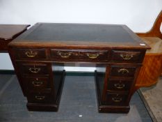 A SMALL LATE VICTORIAN TWIN PEDESTAL DESK WITH INSET WRITING SURFACE. W.99 x D.60cms.