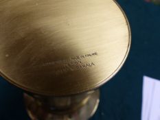 A FINNISH POLISHED BRASS CYLINDRICAL VASE DESIGNED BY TAPIO WIRKKALA WITH PRESENTATION