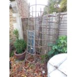 THREE DEMI LUNE ANTIQUE WROUGHT IRON PROTECTIVE TREE SURROUNDS.PROVENANCE: WOLSTON HALL, NR