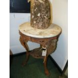 A VINTAGE CAST IRON MARBLE TOP PUB TABLE ON FIGURAL SUPPORTS, CARDIFF MAKER. Dia.50 x H.74cms.