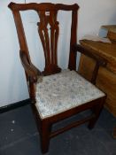 A GEORGIAN COUNTRY OAK AND ELM ARMCHAIR WITH LATER UPHOLSTERED SEAT.