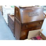 AN OAK BUREAU AND A DRESSING TABLE.