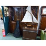 A MAHOGANY SIDE CABINET AND A HOSTESS TROLLEY.