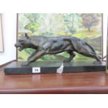 AN ART DECO FIGURE OF A JAGUAR ON SLATE PLINTH.