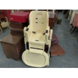 A CHICCO HIGHCHAIR.