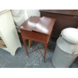 A MAHOGANY SEWING TABLE.