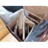 A BOX OF PICTURES AND FRAMES.