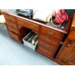 A LATE VICTORIAN MAHOGANY WRITING DESK.