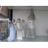 THREE NAO FIGURINES, A LLADRO FIGURINE AND ONE OTHER.