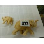 TWO IVORY FIGURES OF ELEPHANTS.