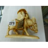 A CHINESE IVORY FIGURE OF SHOULAO RIDING A DONKEY.