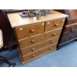 A PINE CHEST OF DRAWERS.