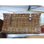 A LARGE WICKER HAMPER.