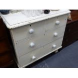 A VICTORIAN PINE CHEST OF DRAWERS.