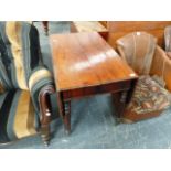 A VICTORIAN MAHOGANY DINING TABLE.