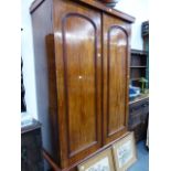 A VICTORIAN MAHOGANY WARDROBE.