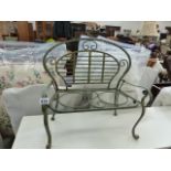 A MINIATURE WROUGHT IRON GARDEN BENCH.