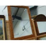 A PINE FRAMED LARGE MIRROR.